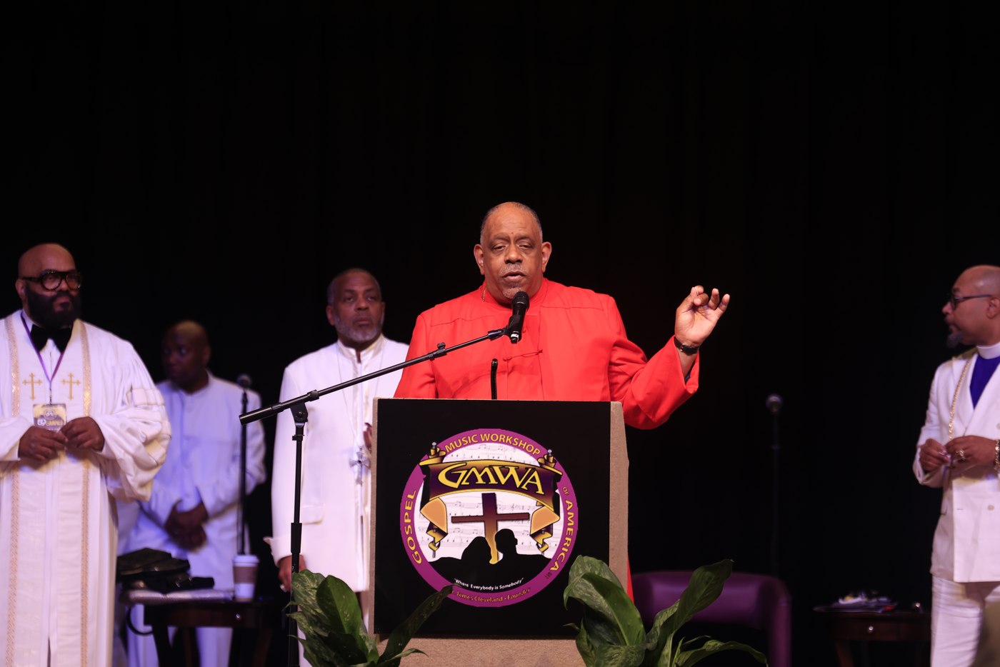 Bishop Albert L. Jamison, Sr. ministering at the podium